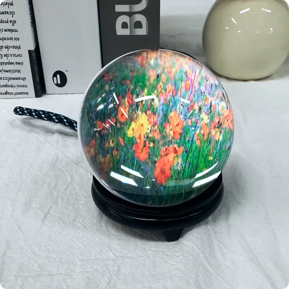 Memory Pearl on its stand, playing a video of a flower field